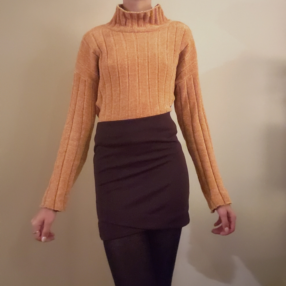 Golden yellow sweater.
